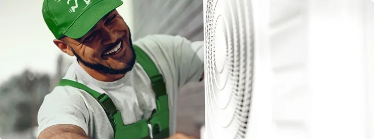 Rapid Response AC Services technician answering frequently asked HVAC questions in Southwest Florida